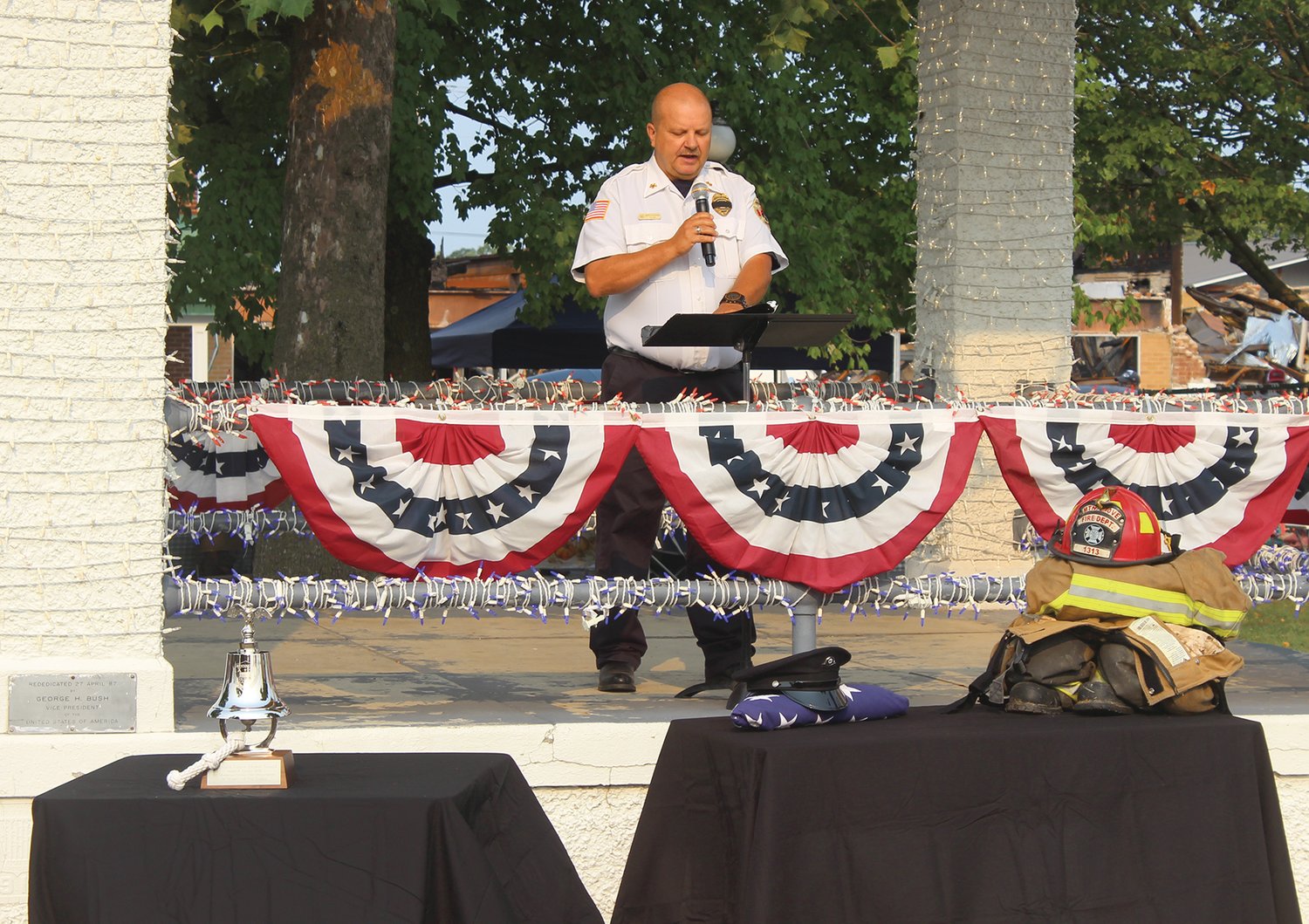 Mountain Grove Fire Chief Mark Bushong reads names off a list of emergency personnel who died during the Sep. 11, 2001 tragedy at the World Trade Center.